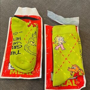 McDonald's Festive Grinch Meal Bags with Red and Blue